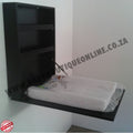Black wall-mounted bed with a mattress in a room setting, featuring 'Baby Boutique Online' branding.