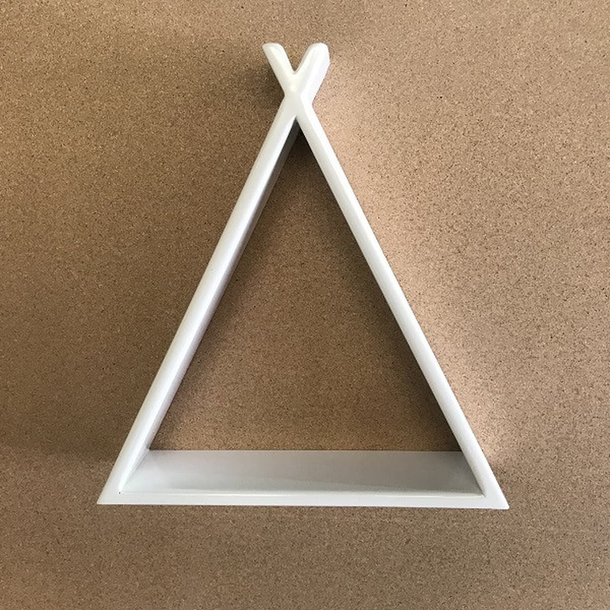 White triangular shelf on a brown background