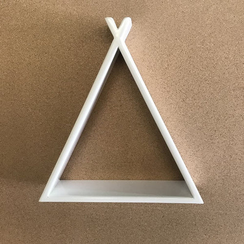 White triangular shelf on a brown background