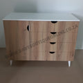 Wooden dresser with white top on a plain background