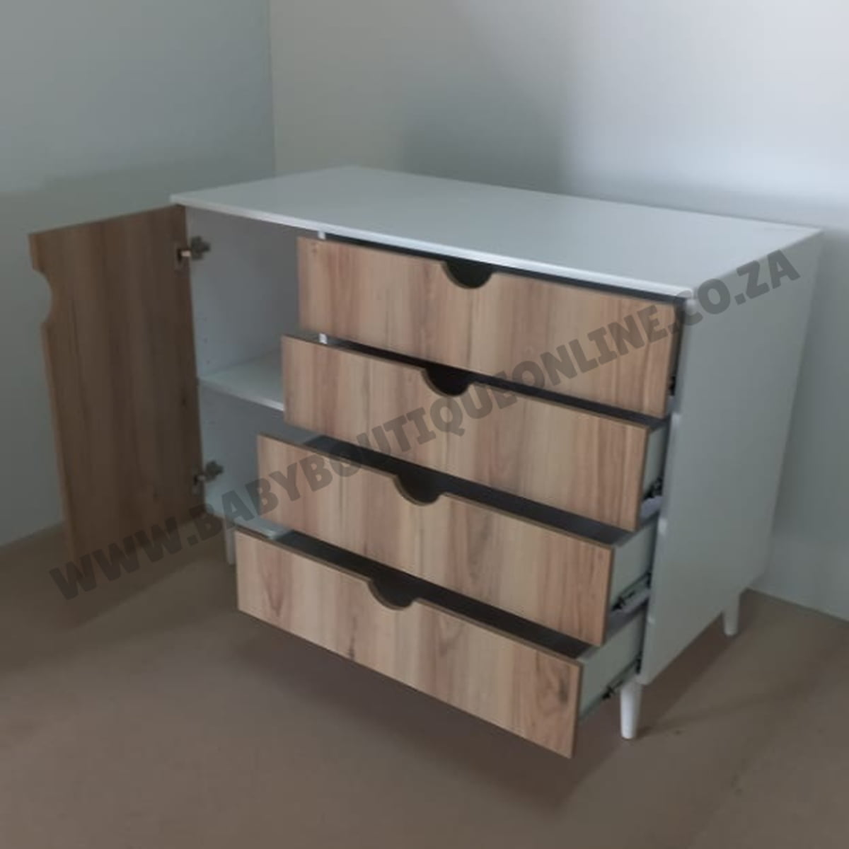 White and wooden furniture with drawers in a minimalistic setting